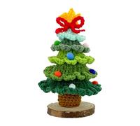 Décoration de sapin de Noël tricotée dans des couleurs arc-en-ciel claires, crochet multicouches et décoration dorée avec cloches sur le dessus de l'étoile de vacances