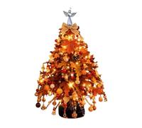 Décoration de table de sapin de Noël avec boules, bijoux et dentelle | Les arbres présentés sur la photo portent des boules et d'autres bijoux brillants ; ils sont foncés, dorés, verts et blancs