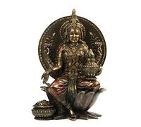 Déesse lakshmi indiens du bonheur sur une sculpture tabouret figurine bronzé