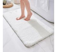 Disolla Tapis de bain antidérapant et lavable en peluche douce et absorbante pour salle de bain, 61 x 122 cm, blanc