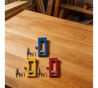 Dispositif d'alignement des trous de charnière de porte pour maintenir le parallélisme entre les charnières et les mortaises du cadre (B)