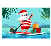 Drapeau De Jardin Santa Claus On Paddle Board With Gifts Tropical Christmas Holiday Garden Flag Premium Drapeaus Décoratif Antifouling Drapeau De Bienvenue Pour Patio Pavillon Cour 152X90CM