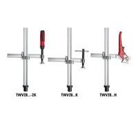 Elément de serrage pour tables de soudage avec longueur de travail variable