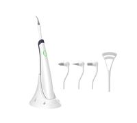 Élimination à ultrasons de la plaque dentaire et de la pierre avec une lampe à LED