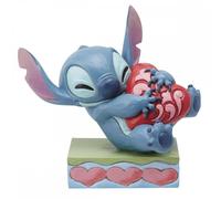 Enesco Figurine Disney Traditions Stitch (Lilo & Stitch) câlinant un cœur Hauteur 13 cm