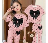 Ensemble 2 pièces avec Top à manches courtes col rond et pantalon évasé, imprimé mignon de mini nœud style ballet, élégant motif délicat de nœud noir. Style chic et jeune, motif de bande dessinée. Con