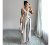 Ensemble 2 pièces femme Lili House composé d'un gilet sans manches à col V avec boutons devant et passepoil contrastant, et d'un pantalon large. Coupe slim, style minimaliste et élégant, polyvalent po