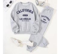 Ensemble adolescent d'un sweat-shirt à capuche manches longues oversize avec imprimé slogan minimaliste et confortable, et d'un pantalon de jogging slim, convenant pour le port à la maison et en extér