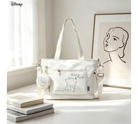 Ensemble de 2 pièces comprenant un grand sac fourre-tout multifonctionnel avec l'impression de Winnie l'ourson de Disney en ligne simple sur fond blanc cassé, et un porte-monnaie. Idéal pour les dépla