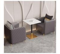 Ensemble de canapés de salle à manger rembourrés en cuir avec table en pierre, design moderne pour restaurants et cafés