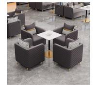 Ensemble de canapés de salle à manger rembourrés en cuir avec table en pierre, design moderne pour restaurants et cafés