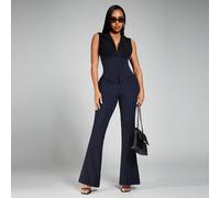 Ensemble de costume femme sexy et élégant rayé bleu et noir, comprenant une veste ajustée et un pantalon évasé à taille basse et col V. Tenue décontractée et professionnelle à la mode, convenant pour 