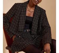 Ensemble de veste courte et short plissé en tweed noir pailleté. Tenue élégante d'automne-hiver pour femmes. Veste en tweed, ensemble de deux pièces, blazer de luxe et collection de vêtements pour fem