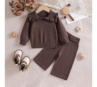 Ensemble deux pièces pour bébé fille, composé d'un cardigan tricoté à manches longues marron minimaliste 2025 et d'un pantalon. Style paresseux et doux avec de larges revers, pull doux, tenue tricotée