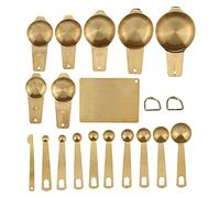 Ensemble d'ustensiles de mesure.Collection de tasses et cuillères en acier inoxydable pour portionner les ingrédients lors des tâches de pâtisserie et de cuisson, avec plaque de