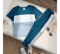 Ensemble t-shirt à manches courtes avec col rond et pantalon, style sportif décontracté et mignon pour garçon. Motif blocs de couleurs et graphique pour les vacances. Convient pour le quotidien, l'éco
