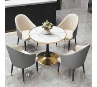 Ensemble table de réception ronde gris clair avec chaises à dossier doux beige, idéale pour les hôtels, cafés et salles de réunion.
