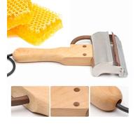Équipement apicole: couteau à miel électrique for désoperculer les cadres de nid d'abeilles grâce à son manche en bois et sa fourchette à désoperculer for une apiculture efficace.