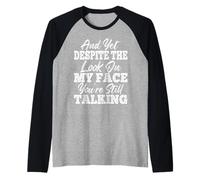 Et pourtant, malgré Le Look sur Mon Visage, Vous Parlez Toujours Manche Raglan