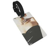 Étiquette élégante pour bagage avec robe de soirée noire, idéale pour les sacs à dos de voyage et de croisière