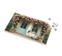 Eurographics Puzzles 1000 pièces Un vélo garé devant une charmante maison ornée de fleurs roses. Puzzle d'images pour adultes, cadeaux de Pâques pour tout-petits (500 pièces)
