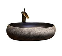 Évier de salle de bain ovale vintage en céramique avec robinet - Vasque de comptoir élégant pour salles de bains élégantes, design artisanal, ustensiles durables, décoration d'intérieur.