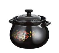 Faitout en argile avec couvercle pour ragoût de soupe et riz dans la cuisine maison