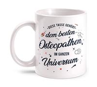 Fashionalarm Tasse - Cette tasse appartient au meilleur ostéopathe, imprimée des deux côtés avec une inscription amusante - Idée de cadeau pour l'ostéopathie médecine - Blanc - 330 ml