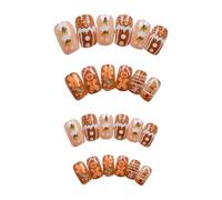 Faux ongles de Noël à presser en forme de bonhomme de pain d'épice en chocolat à coller sur un flocon de neige