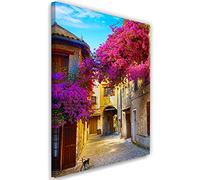Feeby Impression sur Toile Intissé Ancien immeuble Rue étroite Chat Toscane Italie 30x45 cm Image Moderne Tableau Déco Mural Salle De Séjour Pavé de pierre Ciel bleu Rose Fleurs violet