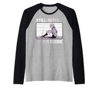 Femme anime. Toujours à l'extérieur. Tempête à l'intérieur. Manche Raglan