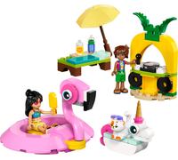 Fête dans la piscine avec les bouées licorne et flamant rose