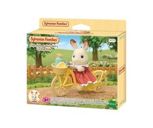 Figure playset Sylvanian Families EPH5777 Fille Lapin Chocolat avec vélo Multicolore