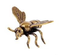 Figurine d'abeille en laiton pour décoration intérieure avec bords arrondis lisses et ton métallique chaud compatible avec les décors neutres et terrestres