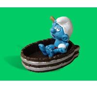 Figurine Schtroumpf dans une baignoire