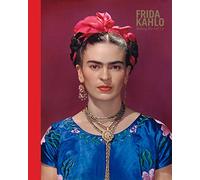 Frida Kahlo making herself up