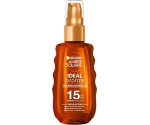 Garnier Ambre Solaire Huile protectrice Ideal Bronze Crème solaire SPF15, indice de protection solaire élevé 15, beurre de karité, résistant à l'eau et non gras, protection UVA et UVB, 150 ml