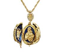 Générique Pendentif Oeuf Style Fabergé Ouvrant Croix et 3 Parties Contenant en Son Centre la Vierge et l'enfant entourée de 2 Anges. Chaîne 55 cm Plaquée Or.. (Bleu)