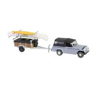 Greenlight Collectibles 32320-B Série d'attelage et de remorquage Modèle moulé sous pression à l'échelle 32-1:64 - Jeep Jeepster Commando SC-1 1968 - Gris avec remorque de canoë, porte-canoë