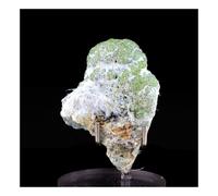 Grenat Démantoïde. 130.0 Ct. Malenco Valley, Lombardy, Italie.