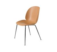 GUBI Chaise Beetle amber brown. structure en acier chromé noir