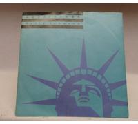 Holly Johnson - AMERICANOS 7" (45) UK MCA 1989 B/W MAMBO DUB MIX (MCA1323) PIC SLEEVE