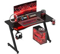 HOMCOM Bureau Gaming 120×60 cm Table Gamer avec Plateau en Fibre de Carbone Support Casque Porte-gobelet Passe-câbles Inclus, Pieds réglables - Bureau d'ordinateur en Acier et Bois Noir