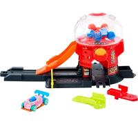 Hot Wheels Boutique de Bonbons du Centre-Ville Coffret en forme de distributeur de bonbons avec véhicule à l’échelle 1/64 en forme de donut et piste Speed Snap , JBM62