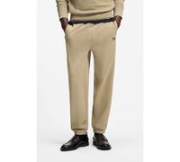 HUGO Bas de survêtement en molleton de coton à badge logoté - Style Nevatro, 50564047 Beige L