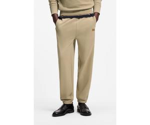 HUGO Bas de survêtement en molleton de coton à badge logoté - Style Nevatro, 50564047 Beige M