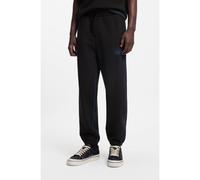 HUGO Bas de survêtement en molleton de coton avec logo et surpiqûres contrastantes - Style Notharos, 50553508 Noir S