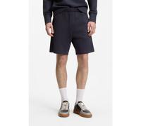 HUGO Short Regular en coton avec badge logo en cuir suédé - Style Nevashort, 50564051 Bleu foncé M