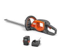 Taille-haie Husqvarna à batterie 215iHD45 avec batterie BLi10 et chargeur 40-C80, silencieux et performant pour un usage privé intensif