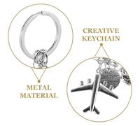 ibasenice Lot De 5 Porte-Clés Souvenirs De Voyage Motif Avion En Métal Argenté Idéal Pour Décorer Un Sac À Main Ou Comme Cadeau D'Invité
